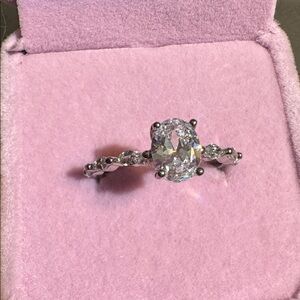 Elegant Sterling Silver Ring with Clear Gemstones